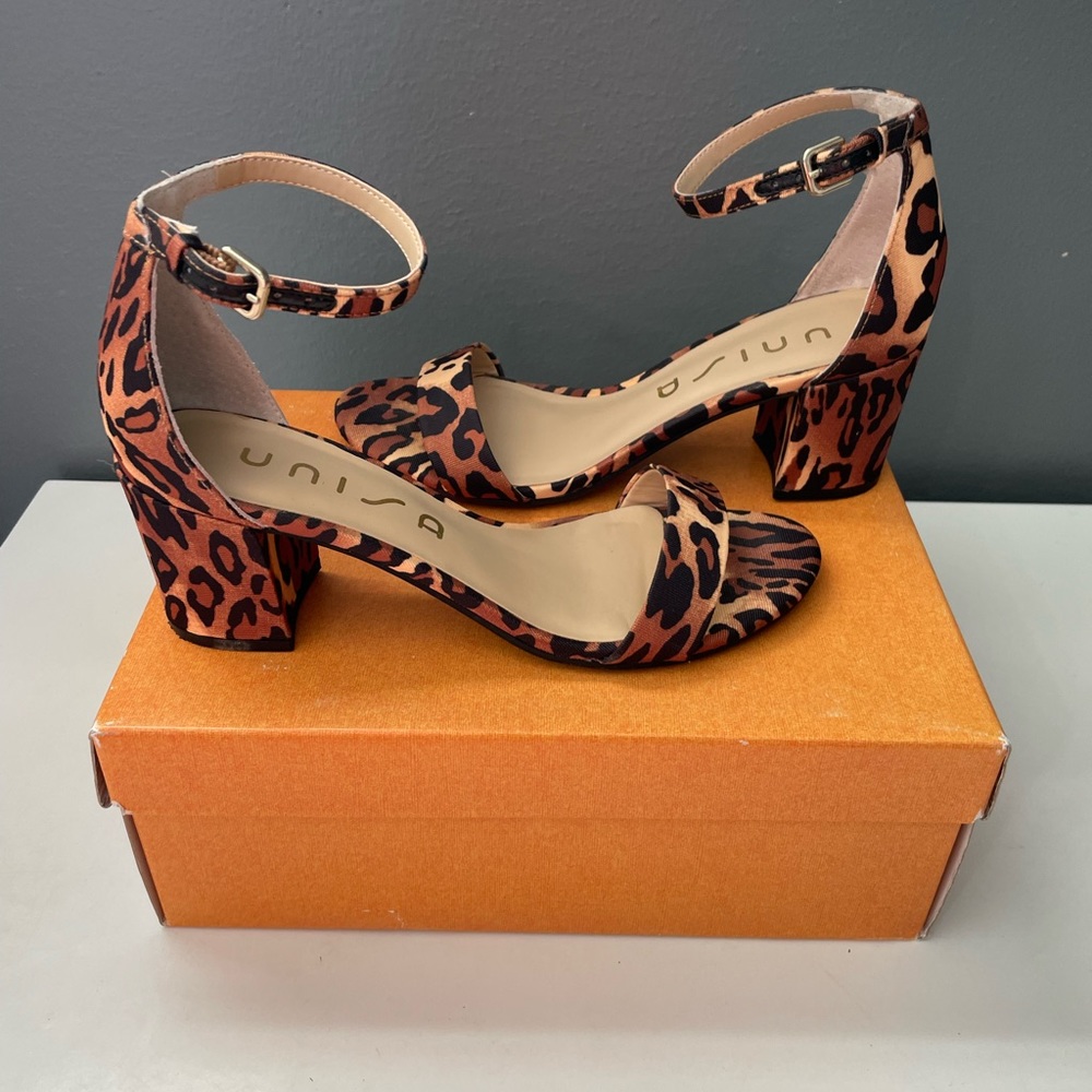 Very cute sandal with ankle strap, leopard print. Worn only two times.